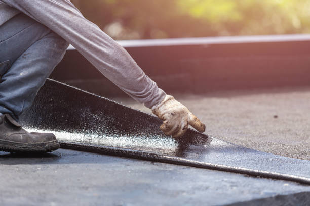 Professional Waterproofing technician working in Geneva, IN